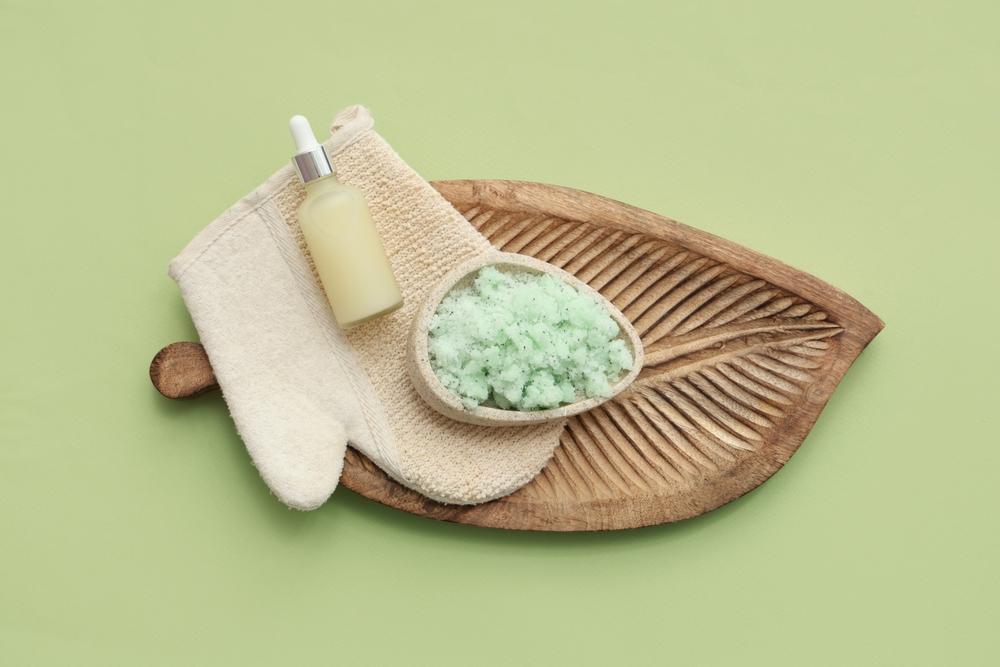 A wooden plate of natural exfoliant used in a Korean body scrub treatment at a spa