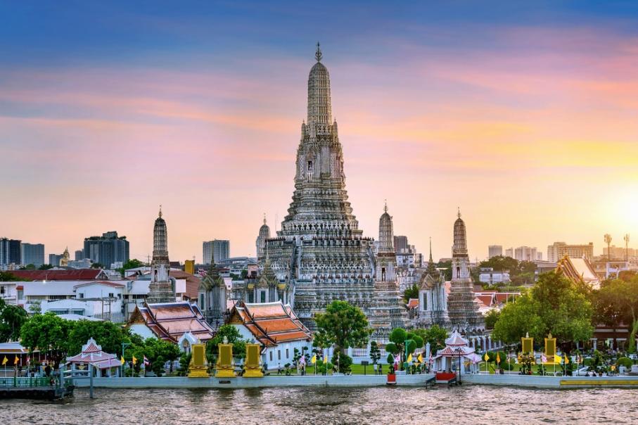 Wat Arun temple at sunset, one of the popular spots and among the best places to go in Thailand.