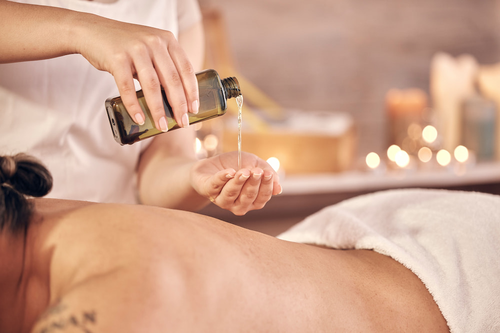 A woman experiences the benefits of an abhyanga massage